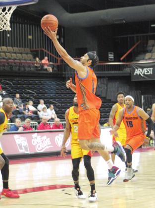 Tevin Foster goes to the hoop during the Potawatomi Fire's first game in Second-Round Playoffs against the Shreveport Mavericks, held at FireLake Arena.