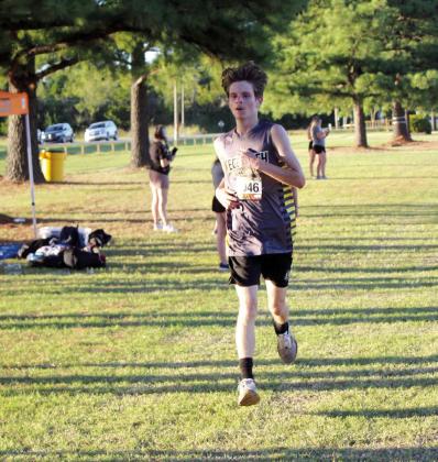 Tecumseh junior Tim Wallace crosses the finish line in third place during the Boys 5K Run with a time of 20:10.17. Countywide &amp;amp; Sun/ Natasha Dunagan