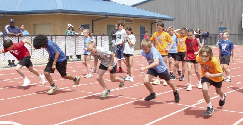 Shawnee sixth-grade boys from area independent elementary schools take off from the starting line in the Division II 100-meter dash during Kiwanis Little Olympics, held at Jim Thorpe Stadium on May 1. The independent schools in Division II include Grove, Pleasant Grove, South Rock Creek, North Rock Creek and Liberty. Photos by Natasha Dunagan, Countywide &amp; Sun. See all our photos from the event by clicking on the camera banner ad below.