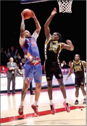 Potawatomi Fire Forward Isaiah Wade puts up a shot and gets the foul in the third quarter of the March 28 home game.