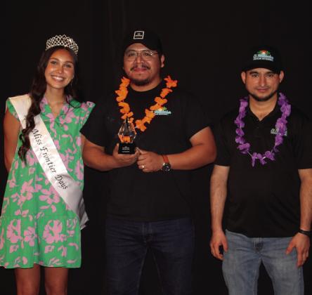 Miss Frontier Days Jalee Meyers poses with Marco Villa and Miguel Ramirez, with El Malecon, who received Business Renovation of the Year during the Tecumseh Chamber of Commerce Annual Meeting &amp; Awards Banquet, held at the Grand Casino Hotel and Resort on Nov. 21. File photo