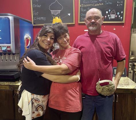 Cope’s Country Cafe’s waitress, Stormi (left), owner Tammy (center) and her husband Tim Carmichael. File photo
