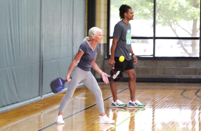 Team "Young and Old" - Timmy Young and Katherine Rosebure - plays in the Juneteenth Pickleball Tournament, held on June 18 at OBU's Recreation and Wellness Center. "Young and Old" took third in Bracket B. Countywide &amp; Sun/Natasha Dunagan