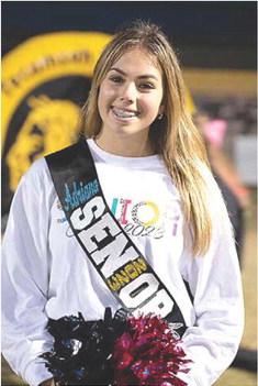 Tecumseh senior Adrianna Fincher poses during Senior Night before the home game with Bridge Creek on Oct. 28. Seniors from cheer, football and band were honored that evening. Photo provided by Kenetta Lisenbee.