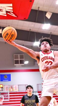 North Rock Creek’s Caleb Hawkins goes up for the bucket. The boys won their 3rd tournament of the season beating Broken Bow.