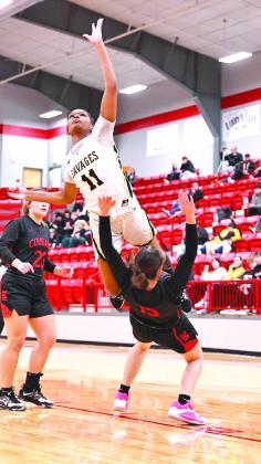 North Rock Creek’s Morgan Campbell stood her ground against Tecumseh’s Janya Bruner for the charge. The Lady Cougars finished second to the Washington team.