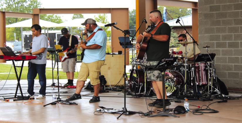 Crowned by Grace performs during the Second Annual Hug-a-thon at Woodland Veterans Park on Aug. 2.