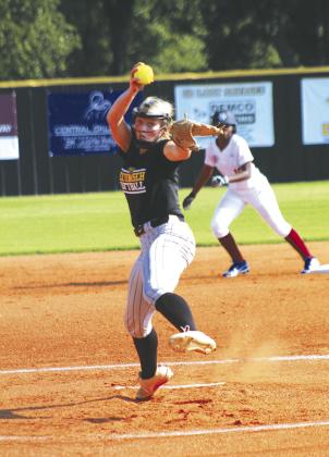 Tecumseh sophomore Steeli Mitchell keeps her focus as she winds up the pitch in the first inning of the Aug. 22 game with Holland Hall. Countywide &amp; Sun/Natasha Dunagan