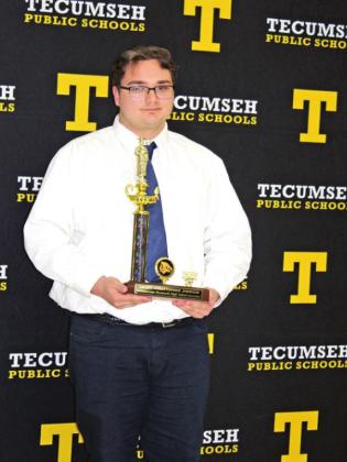 Tecumseh senior Danny Johnson poses with his Salutatorian Award during the THS Academic Awards Reception.