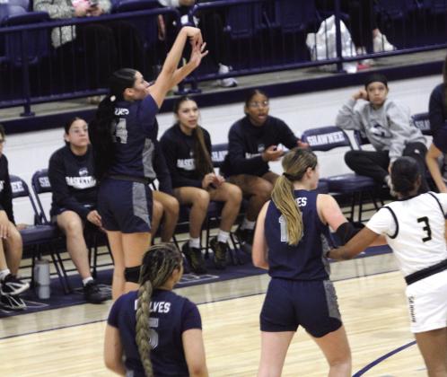 With 10 seconds left in the game, Shawnee senior Daley Rice launches a trey and sinks it in the Jan. 22 game against Midwest City during the Shawnee Invitational. The Lady Wolves lost this hard-fought game 50-54. The day before, they won with Harding Charter 55-19. Natasha Dunagan, Countywide &amp;amp; Sun