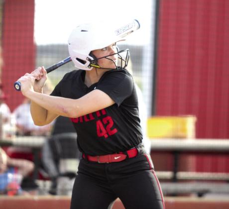 North Rock Creek's Sarah Campbell concentrates on the ball during the slowpitch game with Tecumseh, held at Dale on March 24. The Lady Cougars lost that game, 0-10, and beat Harrah, 12-1. Natasha Dunagan, Countywide &amp; Sun