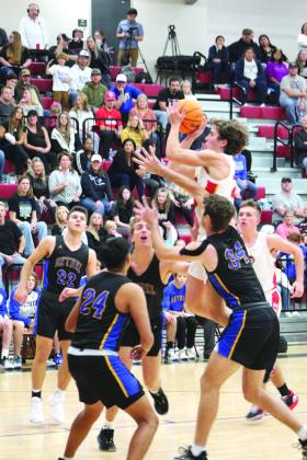 Dale’s Deken Jones makes a jump shot during the first quarter of the home game against Bethel on Dec. 2. The Dale Pirates won 72-55.