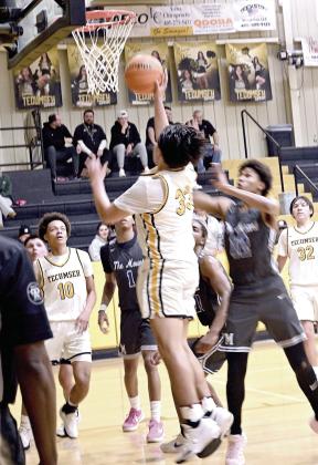 Tecumseh senior Jackson Martin goes to the hoop during the Feb. 11 home game with Mount St. Mary. The Savages lost, 63-88, and will play in the Class 4A District Tournament on Friday, Feb. 21, in Eufaula. Photo courtesy of Kenetta Lisenbee