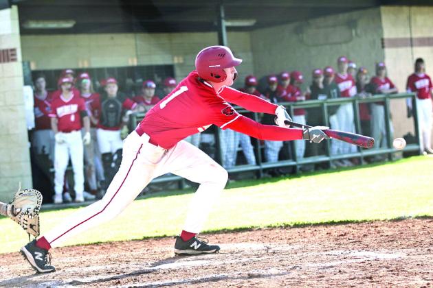 North Rock Creek’s Gus Snodgrass lays down a bunt in the game against Perkins, Monday, Mar. 27. Photo courtesy of Gowin Phonotography