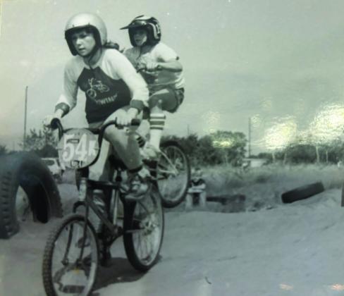 Cindy (Cooper) Parsons, far left, and her brother Rodney Cooper compete in BMX racing at one of the two tracks in Shawnee in the late 1970s. Parsons and Cooper will be inducted into the Oklahoma BMX Hall of Fame on Oct. 12. Photo provided