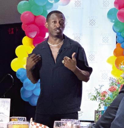 Charles Clark shares personal experiences with the crowd during his motivational speech. Julie Talton, Countywide &amp;amp; Sun