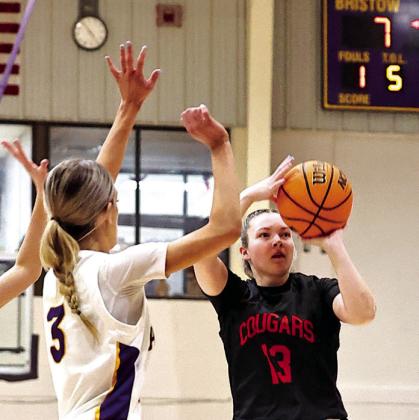 Olivia McRay puts up a three pointer. The Lady Cougars came up short in the regional consolation game against Bristow. Photo courtesy of gowin Photography