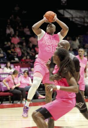 Potawatomi Fire Forward/Center Paul Harrison aims and adds two points to the board during the April 10 Pink Out home game against the Enid Outlaws. The Fire won, 127-113. Natasha Dunagan, Countywide &amp; Sun