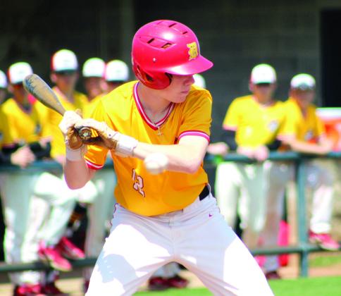 Dale sophomore Easton Edmonson passes on a ball and eventually gets the walk during the tournament game with Bethel, played at Shawnee on April 7.