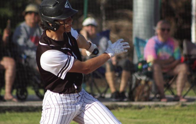 Earlsboro junior Caden Robinson hits a single in the game against Stratford on April 17. The Wildcats won, 12-9.