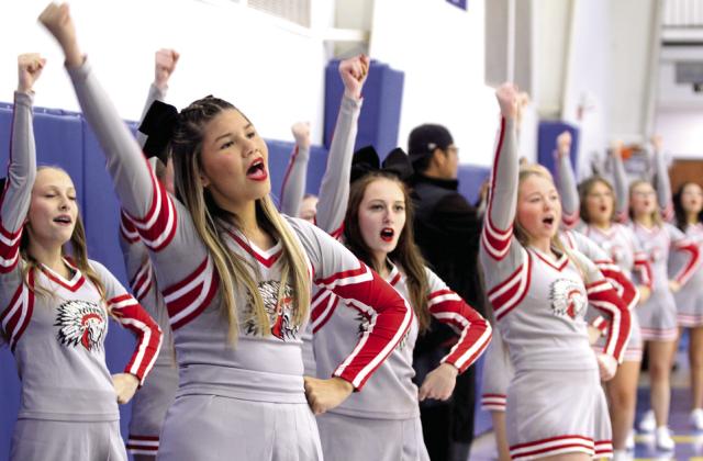 The McLoud High School Cheerleaders lead their fans in a chant during the Redskins game against Sallisaw on Dec. 11 in the Bethel First United Basketball Classic. Natasha Dunagan, Countywide &amp; Sun