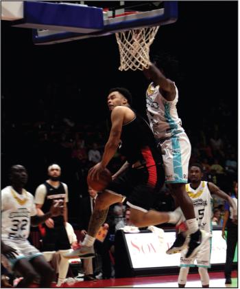 Potawatomi Fire Guard Deshawn Munson goes to the hoop and is fouled in the fourth quarter of the home game with the Wichita Sky Kings on May 25. Munson led with 27 points. Countywide &amp;amp; Sun/ Natasha Dunagan