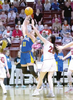 Bethel’s Hannah Davidson aims for the basket during the Class 3A Area game, at Ada, against Comanche on March 5. The Bethel Lady Wildcats won 56-54 and advance to state on March 9.