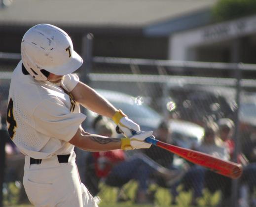 Tecumseh senior Bryson Smith swings at bat, but eventually takes a walk, during the April 4 game with North Rock Creek. The Savages lost, 0-3. Countywide &amp; Sun/Natasha Dunagan