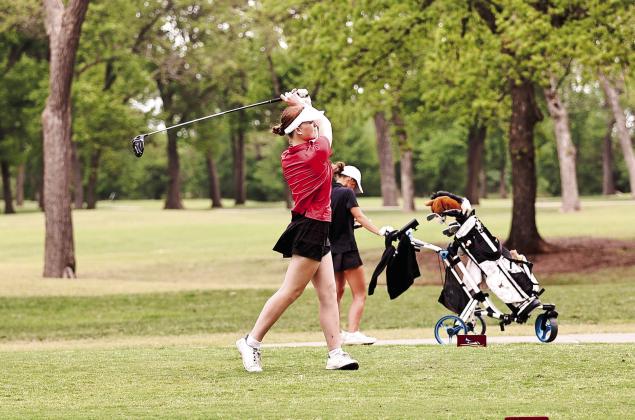 Junior Kimber Chesser tees off at the 3rd hole of FireLake Golf Course on April 14. Photos Courtesy of Gowin Photography