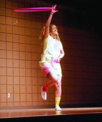 Rachel Collier, a juggler and hula-hoop artist at Inspyral Circus performed a mind warping hula hoop routine at the Tecumseh Public Library on Thursday, July 6, for its annual Summer Learning Challenge. Countywide&amp; Sun/Valerie Scott