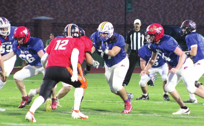 Bethel graduate Dominick Contreras (#77), on the South Team, blocks a North Team player during the Second Annual Citizen Potawatomi Nation All-Star Bowl, held at OBU on June 3. Michael Parsons, also of Bethel, played on the South Team, as well, and they won 26-6. Countywide &amp;amp; Sun/Natasha Dunagan