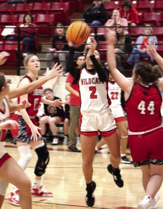 Earlsboro senior Tahnya Kennedy puts up two points in the last 30 seconds of the Jim Walling Classic third-place game with Dover on Jan. 7. Fellow senior Chelsea Deere also made a basket at the 20-second mark.
