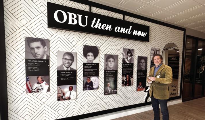 The entry to Shawnee Hall gives visitors a peak into the history of OBU by highlighting some of the alumni. OBU President Dr. Heath Thomas explains that photos pulled from the archives are hung throughout the building as a reminder of the university's history. Suzie Campbell, Countywide &amp; Sun
