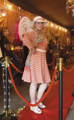 Celebrity Model Patty Wagstaff stepped in at the last minute to fill in for Carol Bass who was unable to attend. Wagstaff was fashioned by Fran Topping for the evening.