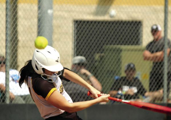Tecumseh junior Jacee Townsend slams a single during the Dale-Tecumseh Tournament game against Lone Grove on Sept. 4. The Lady Savages won three out of their five games over the threeday tournament. Natasha Dunagan, Countywide &amp;amp; Sun