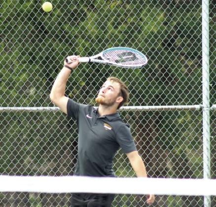Tecumseh senior Xzavier Kommer serves on the #1 Doubles team, with fellow senior Eli Mullins.