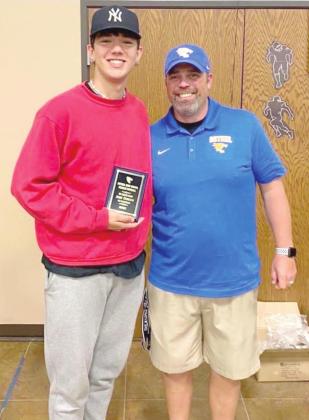 John Gordon joins the 20-Catch Club with 65 catches, presented by Head Football Coach Joey Ginn.
