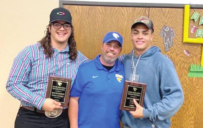 Dominick Contreras and TJ Ramsey receive the Heart of a Champion Award.