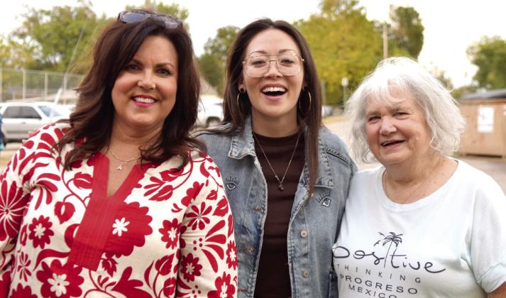 At the Dunbar Heights block party, Fiona Rene poses with her fourth grade teacher, Andrea Brown (left) and reading specialist, Wanda Hadley (right), from when she attended Will Rogers Elementary. Mrs. Brown said, 'Fiona told me back then that she was going to be an actress when she grew up!' Julie Talton, Countywide &amp;amp; Sun