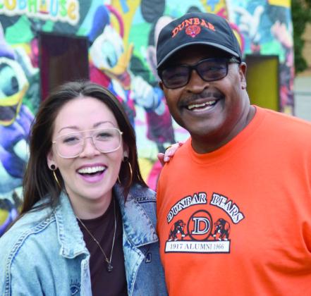 Fiona Rene made an appearance at the Dunbar Heights Community Block Party on Oct. 7. She is pictured here with Dunbar Heights Assoc. President Tim Young. Julie Talton, Countywide &amp;amp; Sun