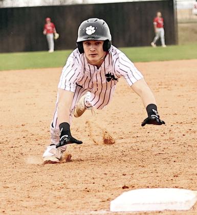 North Rock Creek's Mavrick Wingo beats the throw to be safe at third. NRC beat Skiatook 6-4 and improved their record to 3-2. Photo courtesy of Gowin Photography