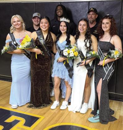Tecumseh High School held their Wrestling Homecoming Ceremony on Feb. 4 and crowned Vivian Hayes as queen. Shown, from left, are Embrie Smith, Coach Ramirez, Zariyah Masquas, Coach Wright, Hayes, Trinity Rakestraw, Coach Sigman and Kylei Gokey. Photo provided.