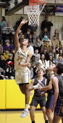 Tecumseh’s Marquan Krush puts up a bucket in the third quarter of the game against Bethel.