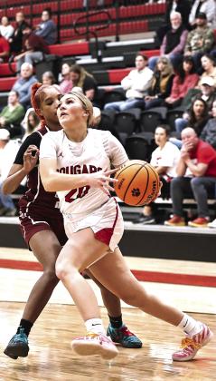 North Rock Creek's Aubree Shivelhood drives the baseline to the basket on Jan.6. NRC girls beat Crooked Oak 75-31. Photo Provided by Gowin Photography