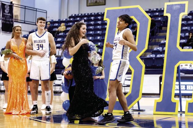Bethel held homecoming coronation Friday, Jan. 27 at the Shawnee High School PAAC. Hannah Davidson and Si Foreman perform a little celebratory dance after Davidson was crowned as Queen. Photo provided by Richelle Treece.