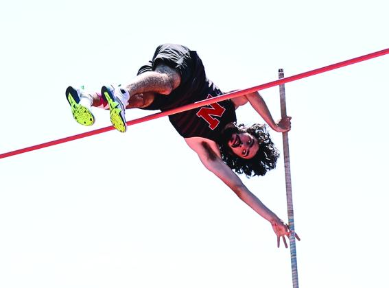 North Rock Creek's Elijah Labbe tied his personal best at 13 feet winning boys pole vault. NRC boys finished with a team score of 284. Photo courtesy of Gowin Photography