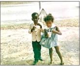 Two young children visit Snow Boy Snow Cones for a delicious, cold snow cone on a hot summer day. Photo provided.
