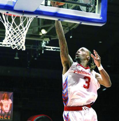 Ricardo Artis II sinks two of his 20 points in the Fire's latest win.