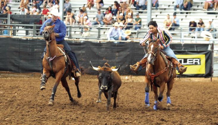 Blake Huddleston of McLoud competes in the steer wrestling event of the International Finals Youth Rodeo on the morning of July 13. CYAN