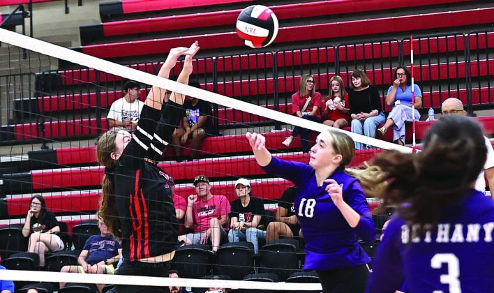 NRC took on Bethany Thursday, Aug. 21. It was not the outcome they wanted. Freshmen won 2 of 3 sets. The JV &amp;amp; Varsity got swept in their sets. Above: Amy Haynes makes a solo block in the middle.